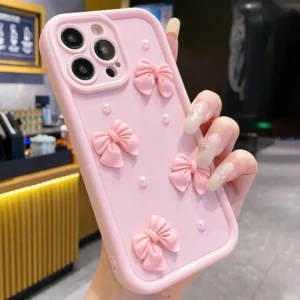 جراب آيفون كوري 3D بفيونكة ولؤلؤ – سيليكون ناعم مقاوم للصدمات